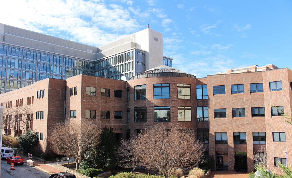 The UNC Lineberger Comprehensive Cancer Center building and Marsico Hall on the UNC-Chapel Hill School of Medicine campus.