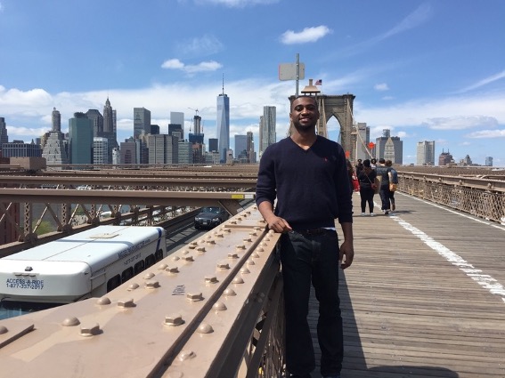 Xavier on a pedestrian bridge in New York City