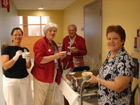 L-R: Cindy Rogers (CCSP), UNC Hospitals Volunteers, Jeanne and Armin Hagen, and Robin Haring (CCSP) completed the weeklong hot lunch service.