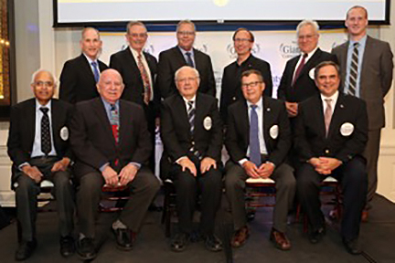 Hyman B. Muss, MD, (front row, second from the right) was one of 11 healthcare professionals who was recognized for advancing the field of oncology through research and clinical practice.
