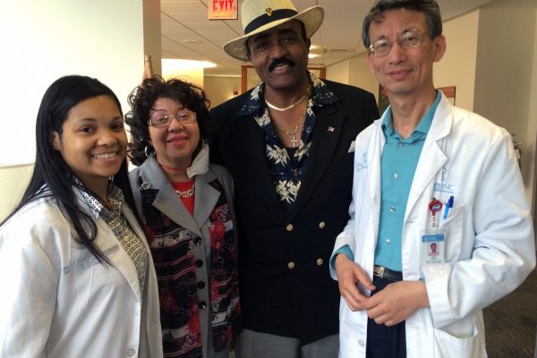Veatrice Harris calls her team of caregivers her “UNC family.”  (L to R) Monique Clayton, RN, BSN, clinical trials study coordinator; Veatrice Harris; her husband Jonathan Harris; and Jack Zhang, RN, BSN, clinical trials study coordinator.