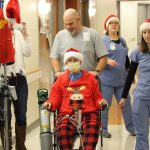 Patients get a little exercise during inaugural 4Onc Santa Stomp