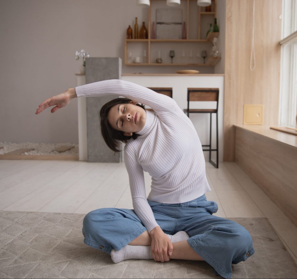A person doing yoga in their home