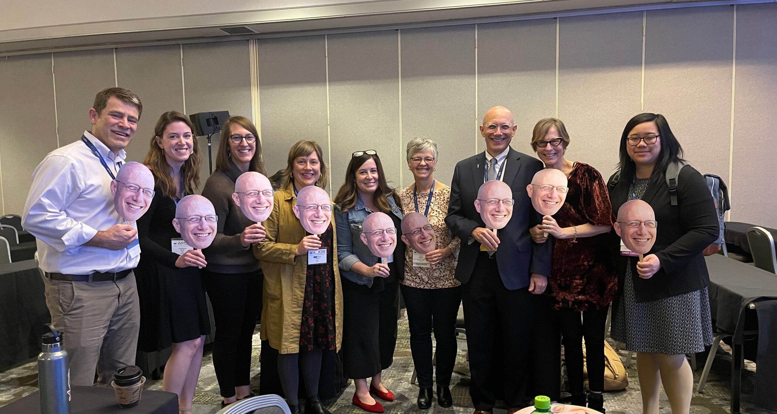 Colleagues celebrate Rosenstein at the APOS conference.