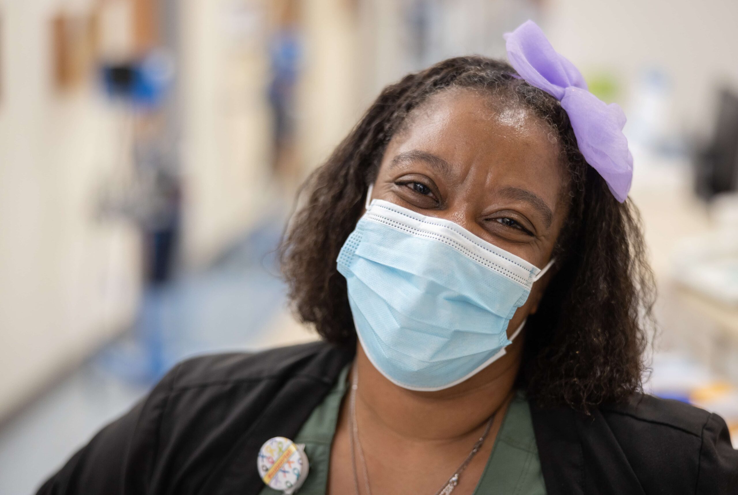 A nurse wearing a face mask. 
