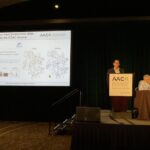 Yi Xu presenting at AACR Conference